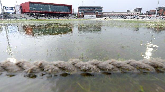 Rain on the outfield at Old Trafford
