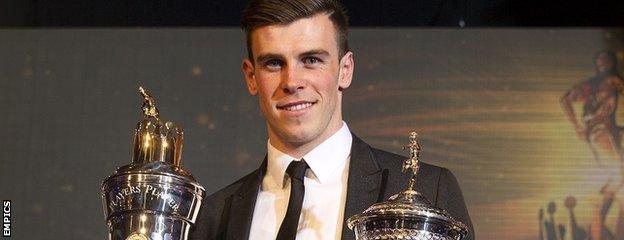 Bale with his awards