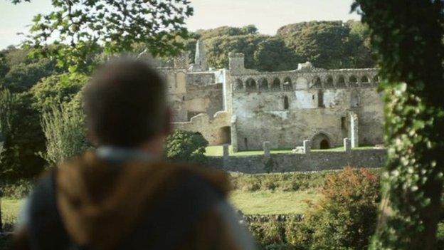 Tourist visits a Welsh castle