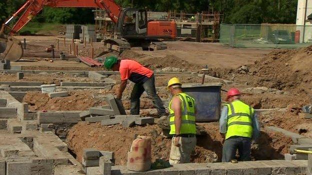 Builders on construction site