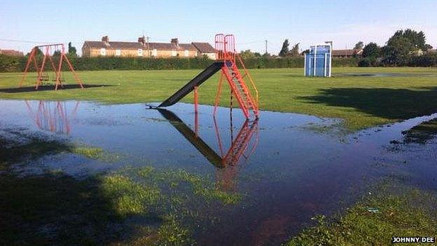 Slide in flood water