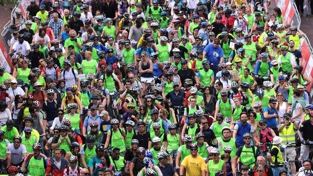 Cyclists make their way down The Mall from Buckingham Palace towards Admiralty Arch in the Prudential RideLondon Freecycle along