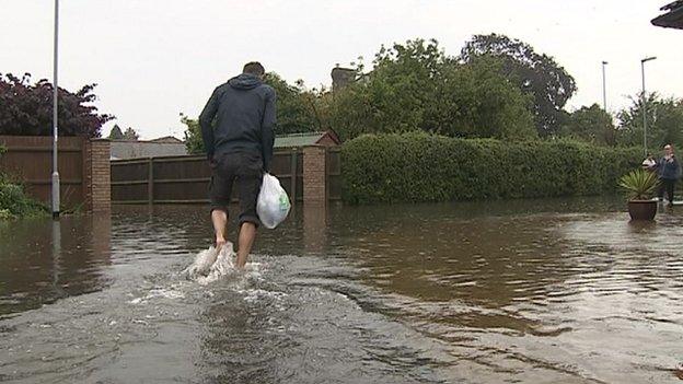 Wading through flood water in March, Cambridgeshire