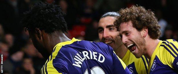 Jose Canas and Chico Flores celebrate with Wilfried Bony against Manchester United in January, 2014