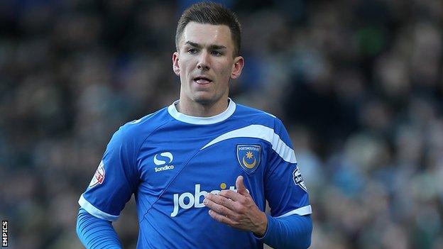 Jed Wallace second-half strike draws Portsmouth level against Exeter.