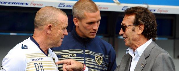 Leeds chairman Massimo Cellino (right) talks to manager Dave Hockaday