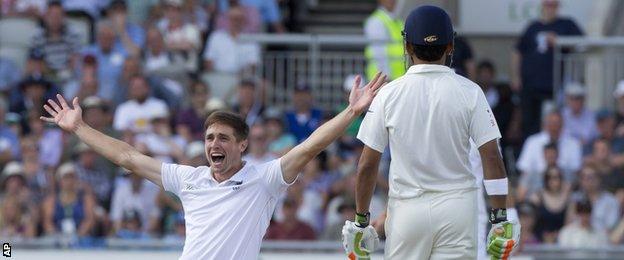 England's Chris Woakes celebrates a wicket