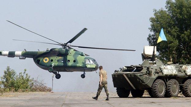 Ukrainian troops in Donetsk region, eastern Ukraine, Saturday, Aug. 9