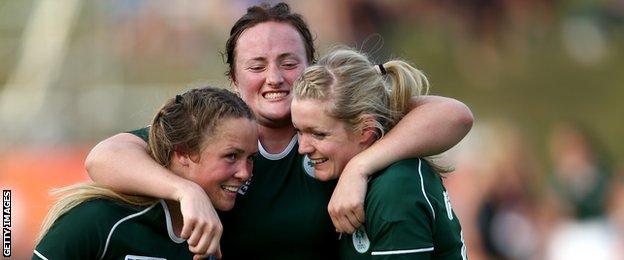 Ashleigh Baxter, Ailis Egan and Vikki McGinn of Ireland embrace after their win over New Zealand