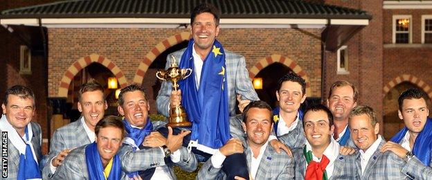 The European Ryder Cup team hold aloft their winning captain Jose Maria Olazabal.