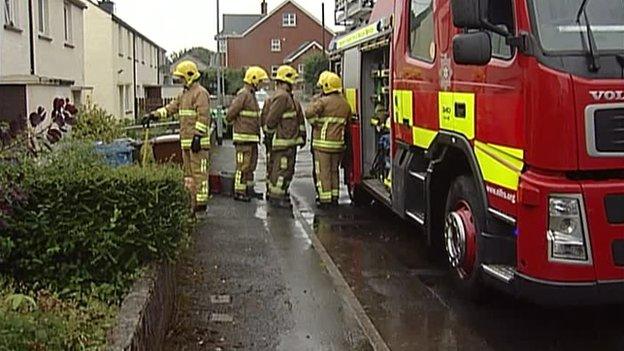 Firefighters used two pumping appliances to protect homes from flood water in O'Neill Avenue