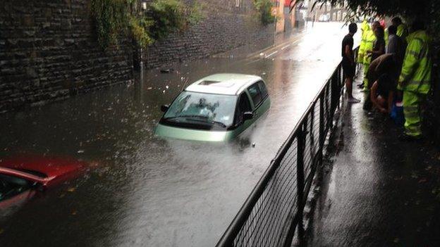 Cars trapped in flood in Cardiff