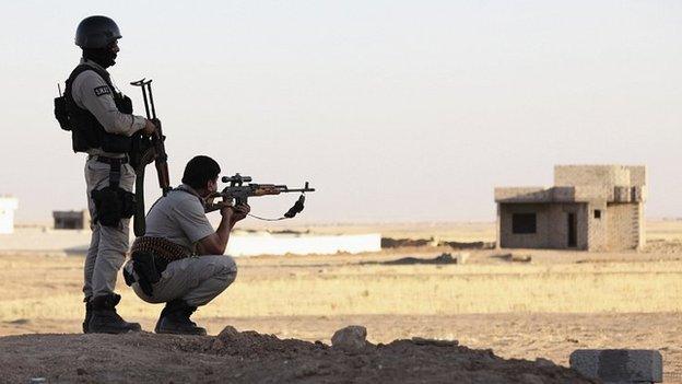 Kurdish forces in a village on the outskirts of the province of Nineveh. 10 Aug 2014