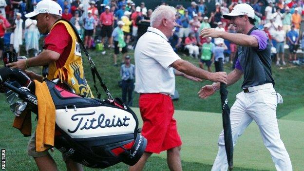 Rory McIlroy and father Gerry celebrate