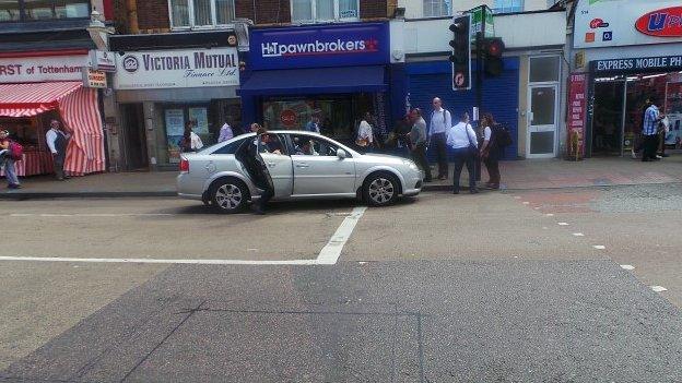 Taxi in Tottenham in which the Commissioner chased the suspects