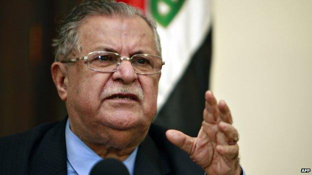 Iraqi President Jalal Talabani speaking during a joint press conference in Baghdad.