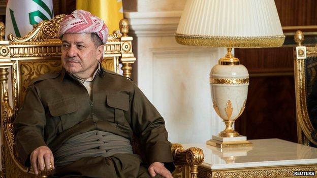 Kurdistan Regional Government President Massoud Barzani listens to U.S. Secretary of State John Kerry