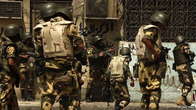 Security forces move in on Muslim Brotherhood supporters camped at Rabaa al-Adawia mosque in Cairo - 14 August 2013