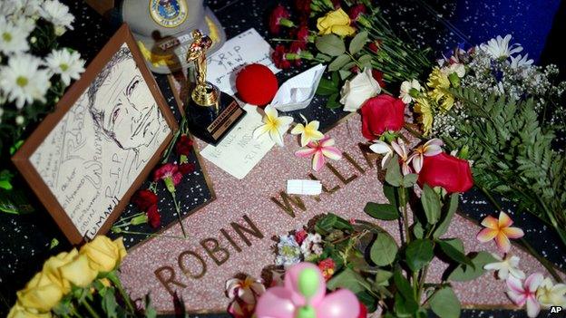 Floral tributes on Robin Williams' star on the Hollywood Walk of Fame