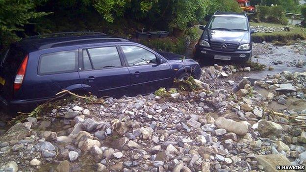 Cars in flood debris near Ullapool