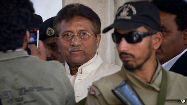 In this Wednesday, April 17, 2013 file photo, Pakistan's former president and military ruler Pervez Musharraf, centre, leaves after appearing in court in Rawalpindi, Pakistan.