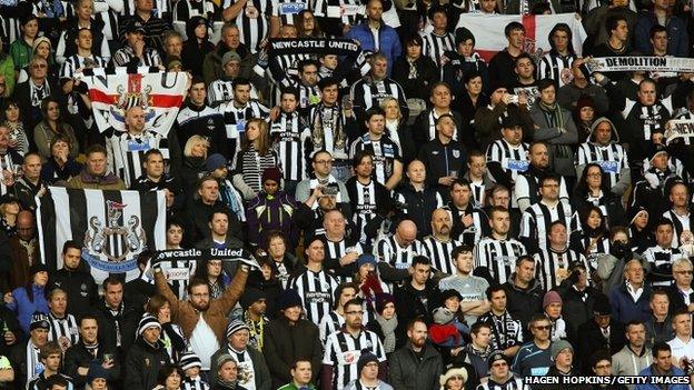 Newcastle fans stand for a minute's silence