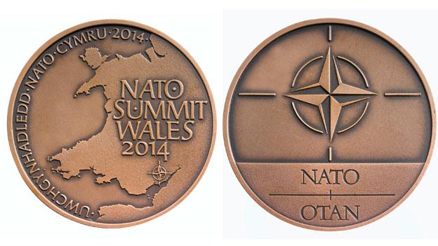 The medal was first designed on computer before being struck in the traditional manner