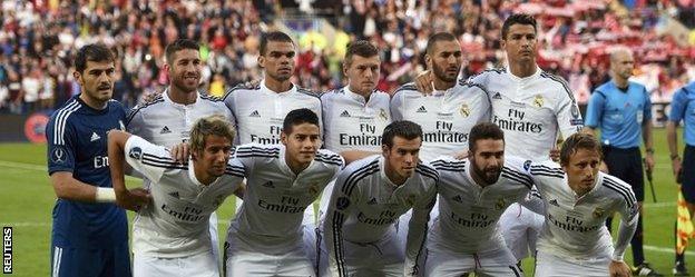 Real Madrid line up before the Super Cup game against Sevilla