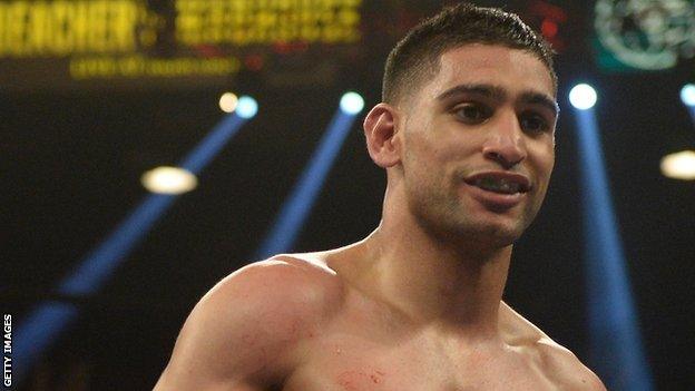 Former world champion Amir Khan