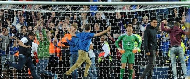 AFC Wimbledon fans on the pitch