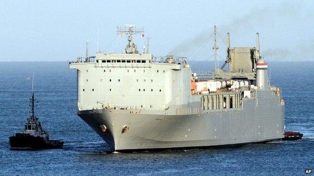 The MV Cape Ray is escorted by tug boats as it arrives at Gioia Tauro port, southern Italy (1 July 2014)