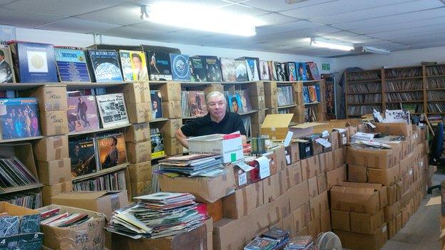 Dan Reddington with his record collection