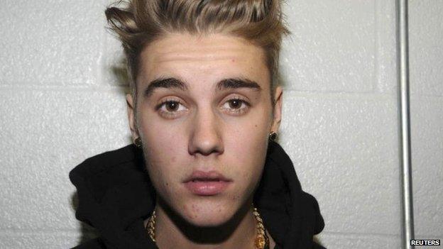 Canadian pop singer Justin Bieber is pictured in police custody in Miami Beach, Florida January 23, 2014 in this Miami Beach Police Department 4 March 2014