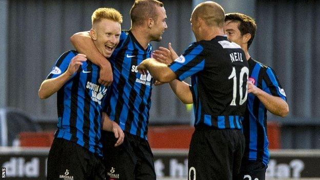 Ali Crawford celebrates with Grant Gillespie, Danny Redmond and Alex Neil