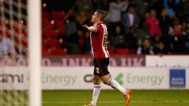 Marc McNulty of Sheffield United celebrates scoring his teams winning goal during the Capital One Cup First Round match between Sheffield United and Mansfield Town