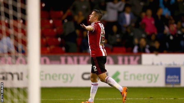 Marc McNulty of Sheffield United celebrates scoring his teams winning goal during the Capital One Cup First Round match between Sheffield United and Mansfield Town