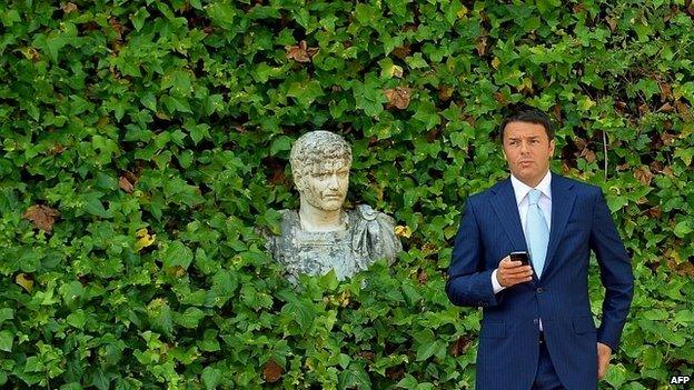 Italian Prime Minister Matteo Renzi waits for the arrival of EU Commission President Jose Manuel Barroso in Rome - 4 July 2014