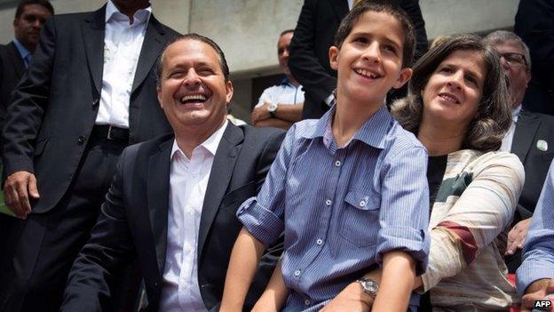 Picture taken on 14 April 2013 showing Eduardo Campos with his son Jose Henrique and his wife Renata