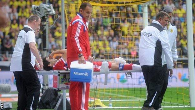 Javi Martinez on a stretcher