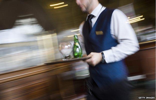 File pic of waiter in Paris