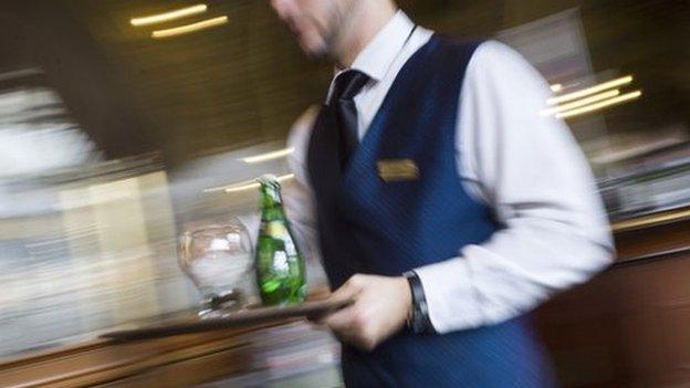 File pic of waiter in Paris