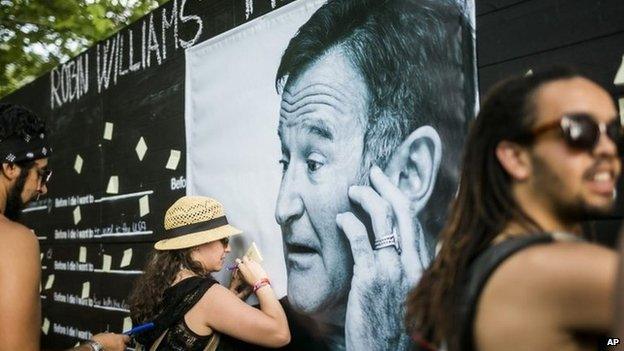 Festival goers pay tribute to the late actor Robin Williams at the 22nd Sziget (Island) Festival on the Shipyard Island in Northern Budapest, Hungary 13 August 2014