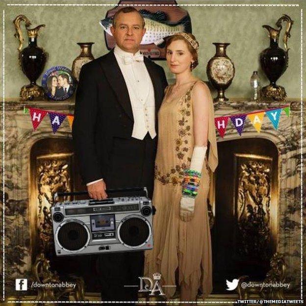 The Early of Grantham carrying a boom box and Lady Edith who is wearing loom bands and posing in front of a Big Mouth Billy Bass