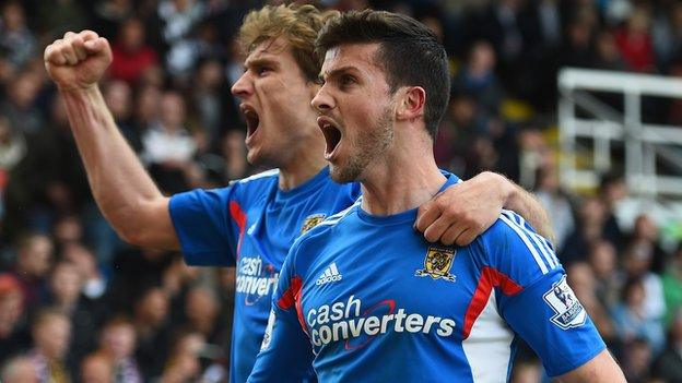 Shane Long celebrates scoring for Hull