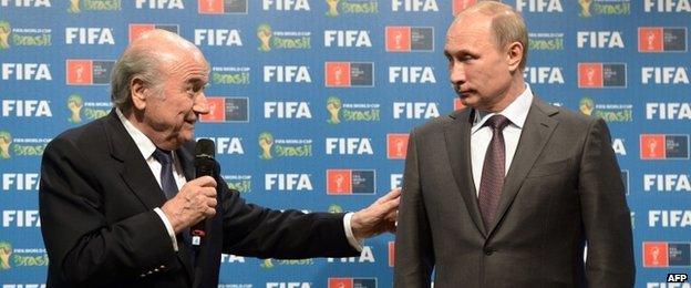 Fifa president Sepp Blatter (L) and Russia's President Vladimir Putin during a handover ceremony for the 2018 World Cup in Rio de Janeiro on 13 July, 2014