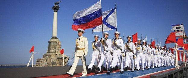 Russian sailors march during celebrations to mark Navy Day in the Crimean port of Sevastopol, 27 July, 2014