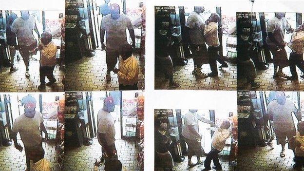 A series of CCTV pictures showing a robbery in a store in Ferguson