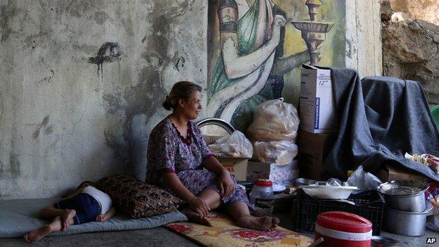 A Yazidi woman and child