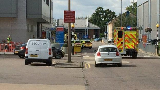 Still of police outside Basildon Hospital on August 16