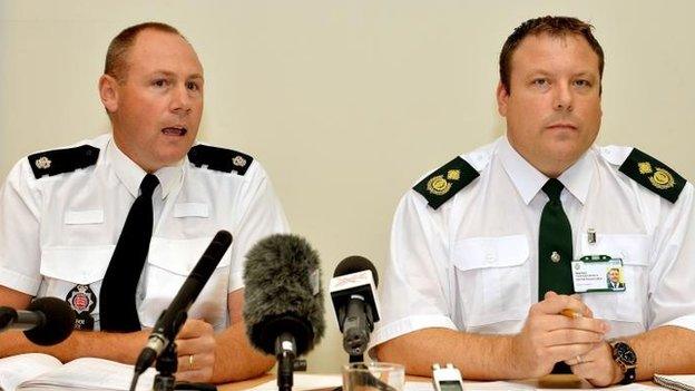 Superintendent Trevor Roe from Essex Police and Daniel Gore of the East of England Ambulance service, during a press conference close to Tilbury Docks in Essex